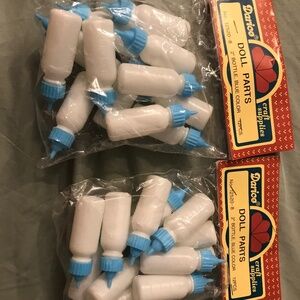 Vintage plastic baby bottles old toys